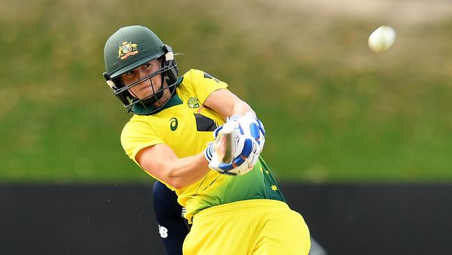 Ellyse Perry launches a huge six.