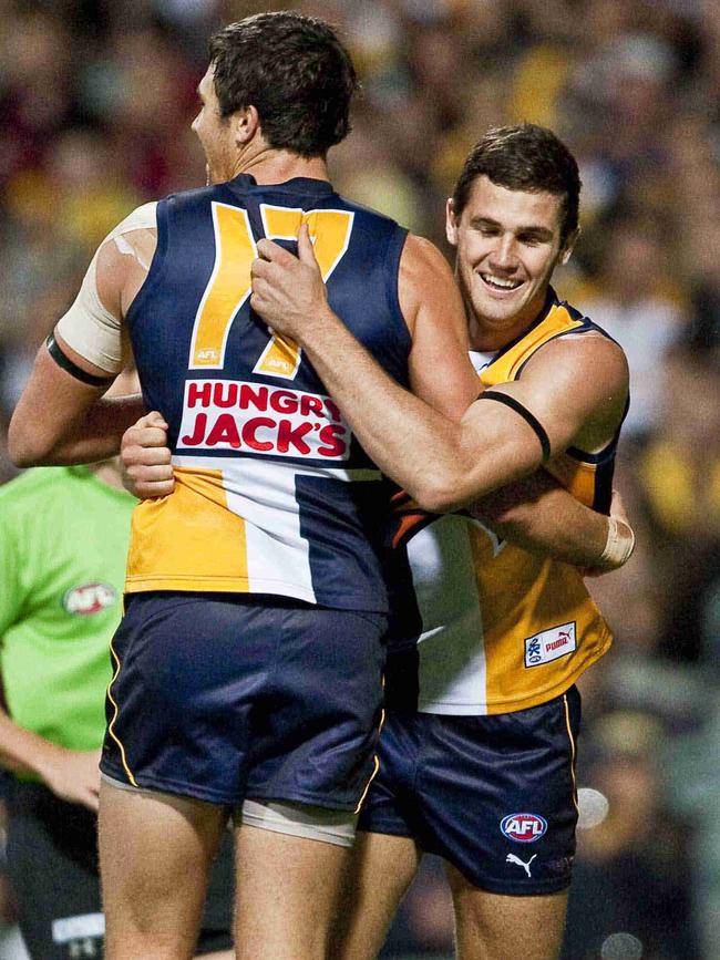 Josh Kennedy (left) and Jack Darling celebrate a goal during Darling’s debut 2011 season. Picture: Tony McDonough / AAP