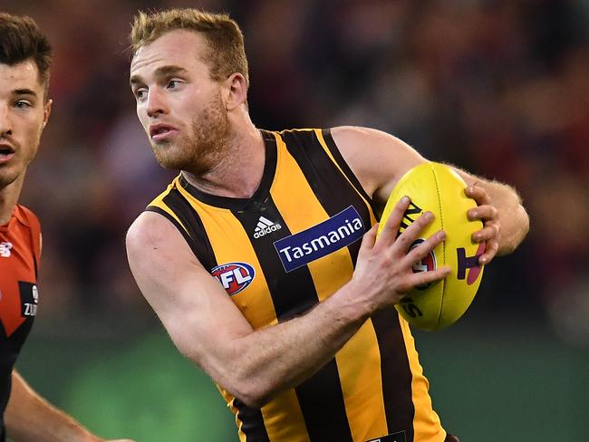 Alex Neal-Bullen of the Demons (left) and Tom Mitchell of the Hawks contest during the First Semi Final between the Hawthorn Hawks and the Melbourne Demons in Week 2 of the AFL Finals Series at the MCG in Melbourne, Friday, September 14, 2018. (AAP Image/Julian Smith) NO ARCHIVING, EDITORIAL USE ONLY