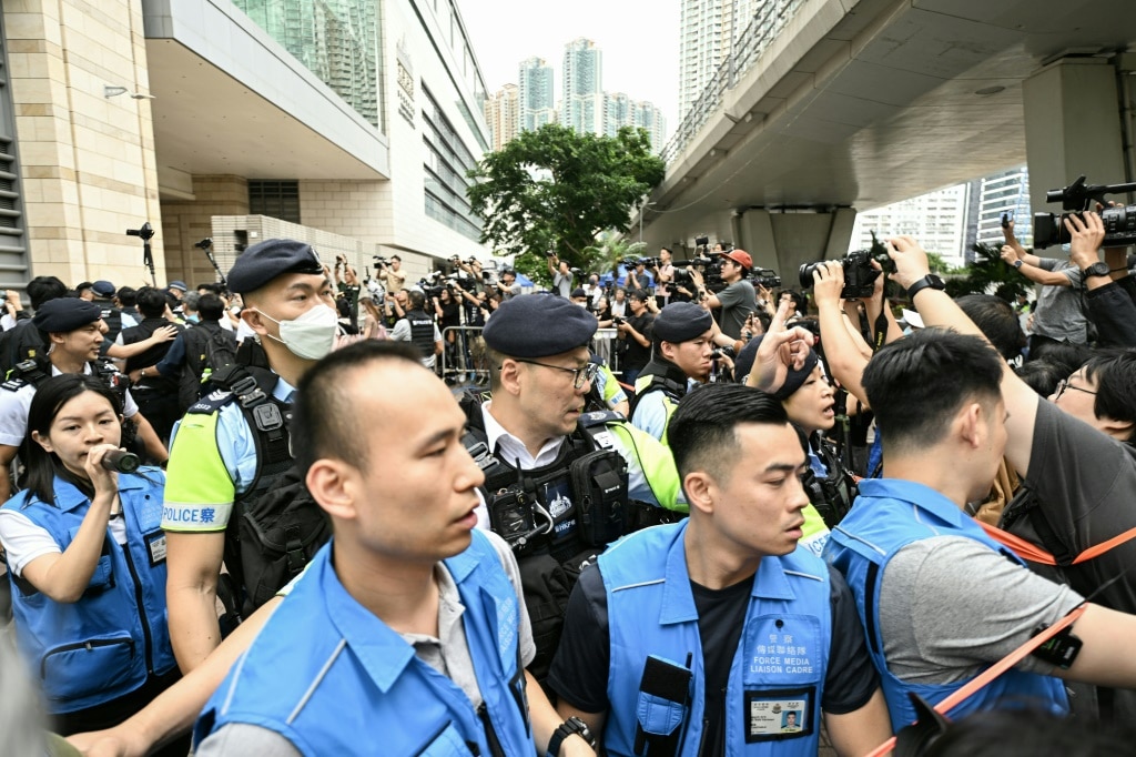 14 Hong Kong democracy campaigners found guilty of subversion | news ...