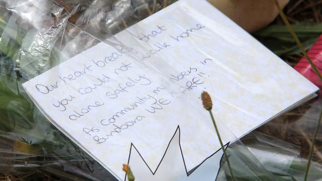 A message for Aia Masarwe is left on a card at the site where the exchange student was found dead. Picture: Aaron Francis