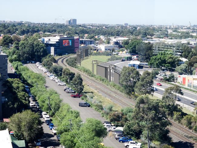 After picture of what the twin tracks will look like, near Baxter St.