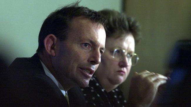 Tony Abbott, then Minister for Workplace Reform; and Senator Amanda Vanstone, then Minister for Family and Community Services, speak to the media in 2002. Picture: Michael Jones/File