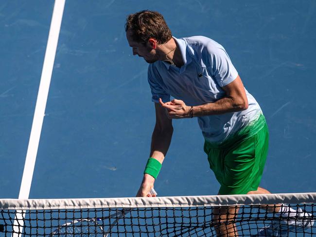 This hand out picture released by the Tennis Australia on January 14, 2025 shows Russia's Daniil Medvedev smashes his racquet during his first round match on Rod Laver Arena at the Australian Open tennis tournament in Melbourne. (Photo by JAMES GOURLEY / TENNIS AUSTRALIA / AFP) / ----EDITORS NOTE ----RESTRICTED TO EDITORIAL USE MANDATORY CREDIT "AFP PHOTO / TENNIS AUSTRALIA/ JAMES GOURLEY â NO MARKETING NO ADVERTISING CAMPAIGNS - DISTRIBUTED AS A SERVICE TO CLIENTS