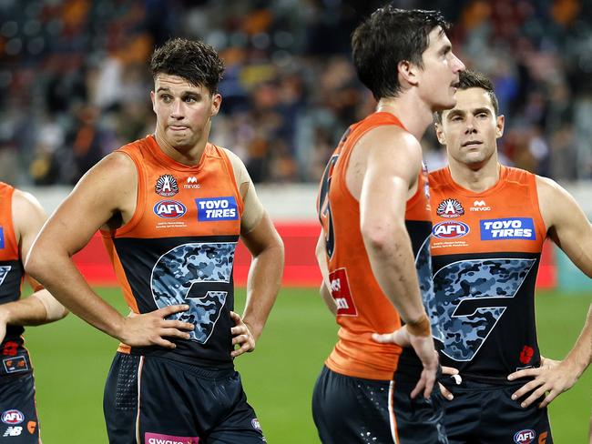 Giants Finn Callaghan and team-mates after the loss during the AFL Round 7 match between the GWS Giants and Western Bulldogs at Manuka Oval, Canberra on April 26, 2025. Photo by Phil Hillyard (Image Supplied for Editorial Use only - NO ON SALES - copyright Phil Hillyard )