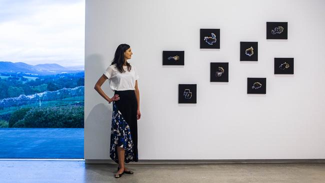 TarraWarra Biennial guest curator Nina Miall stands in front of ‘Looking into the land attached’, 2020, by Louisa Bufardeci. The exhibition will open at the TarraWarra Museum in Healesville, in Victoria’s Yarra Valley, this weekend. Picture: Aaron Francis​