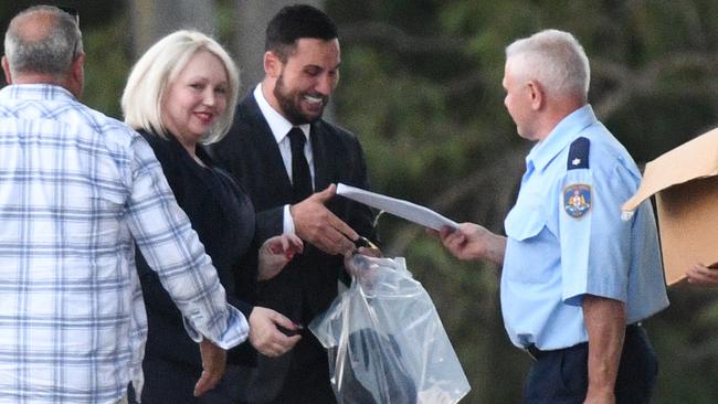 Mehajer collects paperwork and possessions.