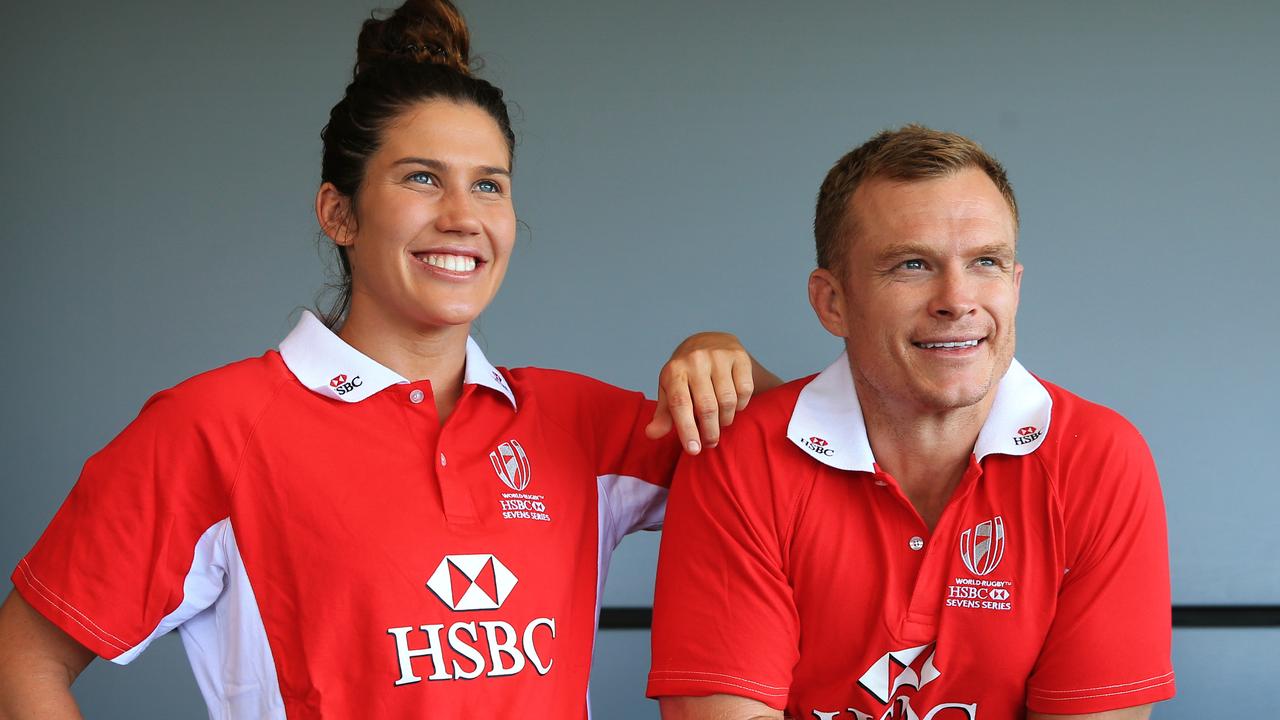 Charlotte Caslick with the Australian women sevens coach Tim Walsh.  Picture: Toby Zerna