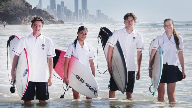 Members of the Miami State High Surfing squad who hope to be competing at the Australian interschool surfing championships. From left they are Brodie Scott 16, Kauri Hueston-Connor 15, Ryder Payne 16, and Emma Ryan 16. Picture Glenn Hampson