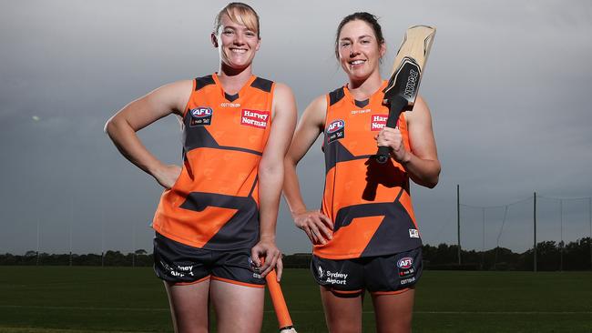 Britt Perry and Jodie Hicks have put away the bats for a full footy season. Picture: Brett Costello