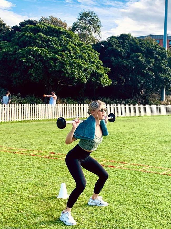 Sam Frost at the park working out.