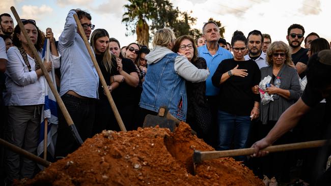 Mourners grieve during the funeral of Peruvian-Israeli civilian Dr. Daniel Levi Ludmir at Yehud Monosun cemetery, who was reportedly killed while treating the wounded, following the attack by Hamas on October 7, 2023. Picture: Leon Neal/Getty Images