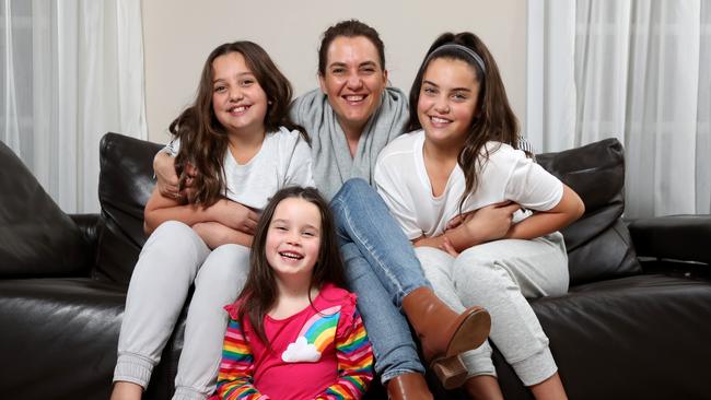 St Ives mum Julia Lipari with her daughters Lily, year 6 student (right), Isabella, year 5 student, and Olivia, who is in kindergarten. Julia said she has not had a good experience with NAPLAN and thinks that it forces teachers to ‘rote teach’. Picture: Jonathan Ng