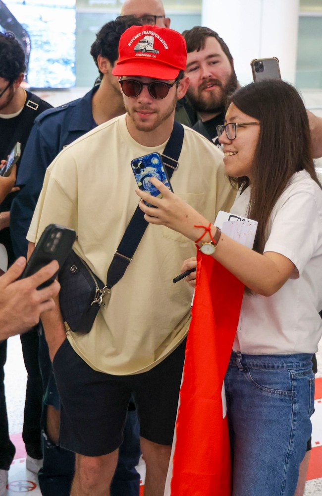 Jonas Brothers Nick, Joe and Kevin arrived at Sydney Airport on February 28. Picture: Media Mode