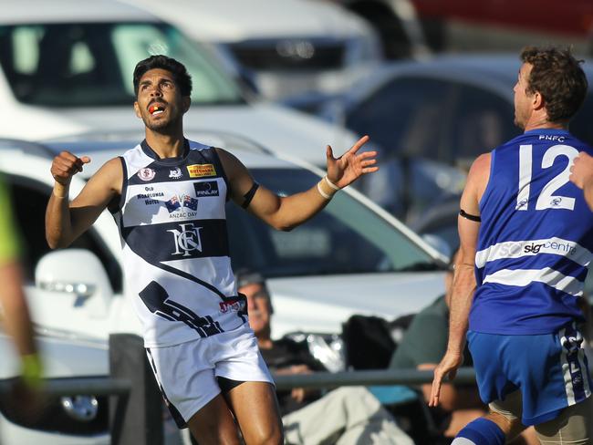 Port Noarlunga v Noarlunga SFL game. Noarlunga's Terry Milera waits on the outcome of a snapped shot at goal. 27 April 2019. (AAP Image/Dean Martin)