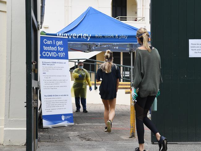 Nursing staff from St. Vincent’s Hospital at a COVID-19 testing clinic in Bondi Pavilion. Picture; AAP.