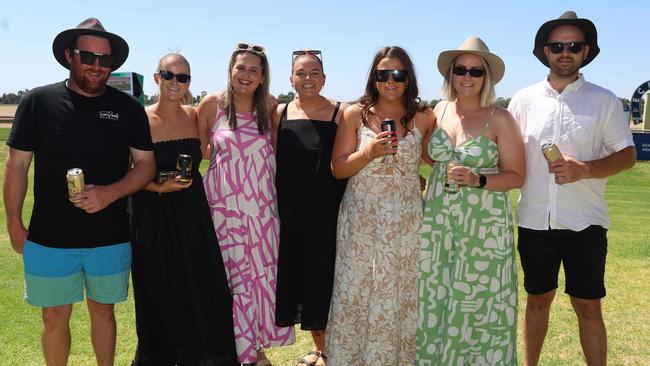 Ash, Barney, Caitlin, Rosie, Emma, Steph and Tom attend the 2024 Echuca Cup races Picture: Brendan Beckett