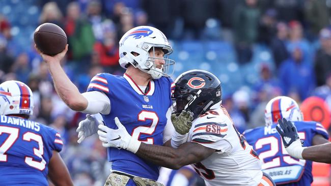 Nathan Peterman is hit as he throws, on a sorry day for the Bills QB. Picture: Getty