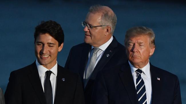 Canada's Prime Minister Justin Trudeau, Prime Minister Scott Morrison and US President Donald Trump at the family photograph during the G7 Summit.