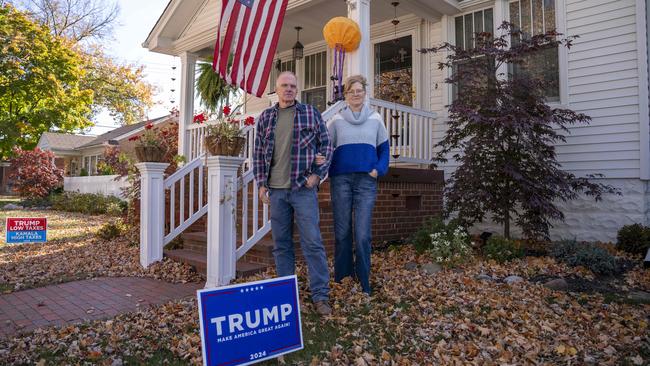 Trump supporters Terry and Laura Burke stand outside of their home in Dearborn. Picture: Valaurian Waller