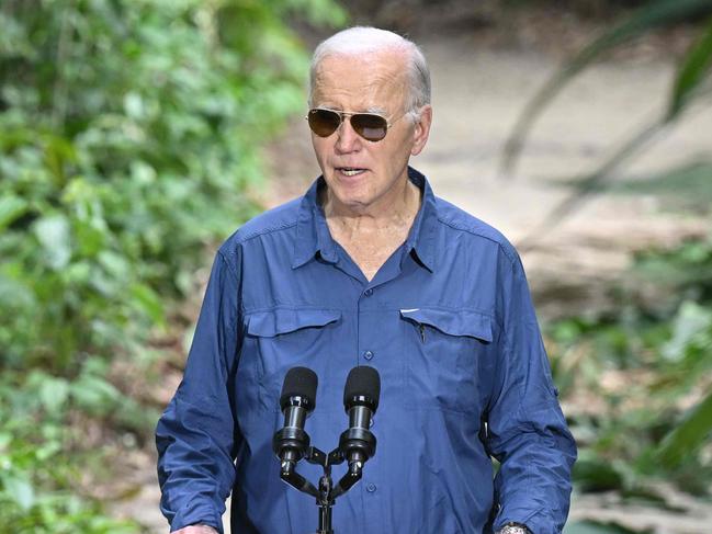 US President Joe Biden speaks after signing a proclamation designating November 17 as International Conservation Day during a tour of the Museu da Amazonia as he visits the Amazon Rainforest in Manaus, Brazil, on November 17, 2024, before heading to Rio de Janeiro for the G20 Summit. (Photo by SAUL LOEB / AFP)