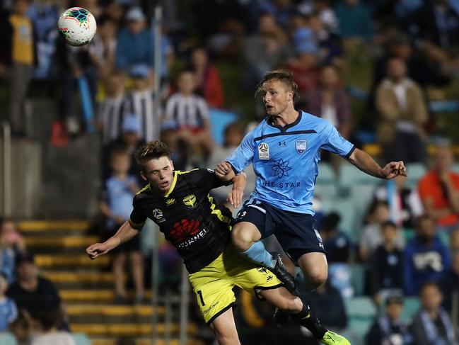 Sydney FC's Rhyan Grant heads a ball during the Sydney FC v Wellington Phoenix A-League match at Leichhardt Oval, Sydney. Picture: Brett Costello