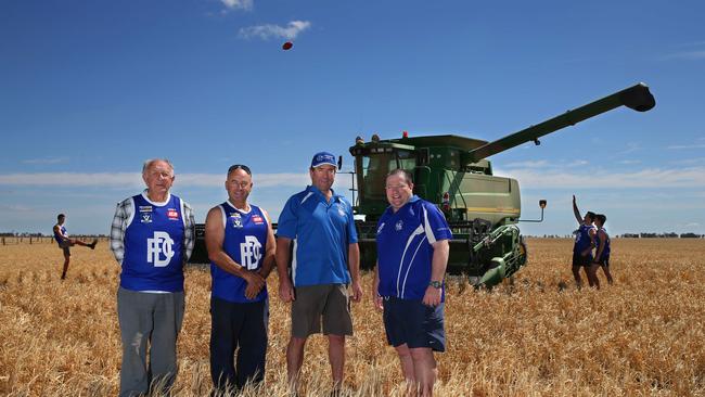 Bill Anderson, left, on the Donald Football Club farm in 2014 with Dean Griffiths, Colin Gilmour and Danny Forrest. Picture: Andy Rogers