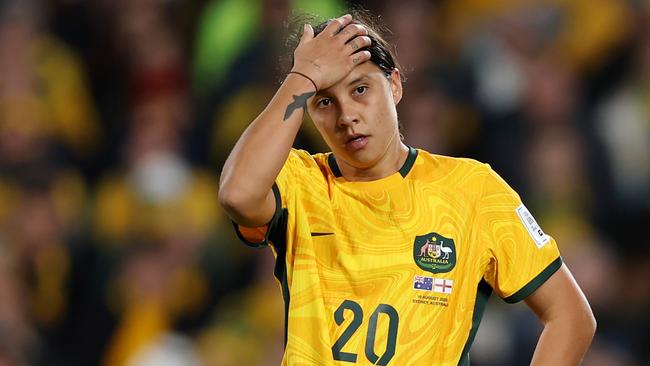 SYDNEY, AUSTRALIA - AUGUST 16: Sam Kerr of Australia reacts after England's second goal  during the FIFA Women's World Cup Australia & New Zealand 2023 Semi Final match between Australia and England at Stadium Australia on August 16, 2023 in Sydney, Australia. (Photo by Alex Pantling - FIFA/FIFA via Getty Images)