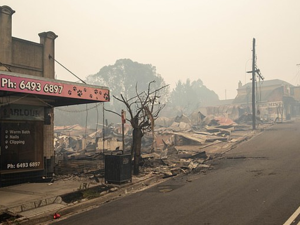 The fire-ravaged town of Cobargo was left devastated after a father and son died and buildings were lost.