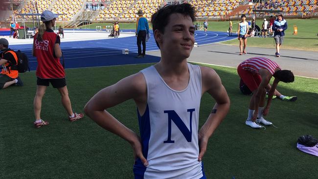 Tom Mallett from Nudgee is relieved after winning his event at the GPS Track and Field.