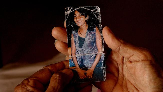 Irene Davey holds a photo of her missing daughter Sara-Lee Davey, who disappeared in 1997. Picture: Glenn Campbell