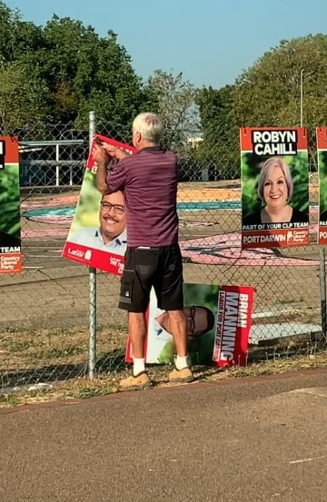 CLP donor Ray Bail spotted tearing down ALP corflutes.