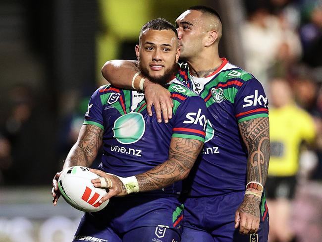 AUCKLAND, NEW ZEALAND - JULY 26: Addin Fonua-Blake (L) is congratulated on scoring a try by Marata Niukore of the Warriors during the round 21 NRL match between New Zealand Warriors and Wests Tigers at Go Media Stadium Mt Smart, on July 26, 2024, in Auckland, New Zealand. (Photo by Dave Rowland/Getty Images)