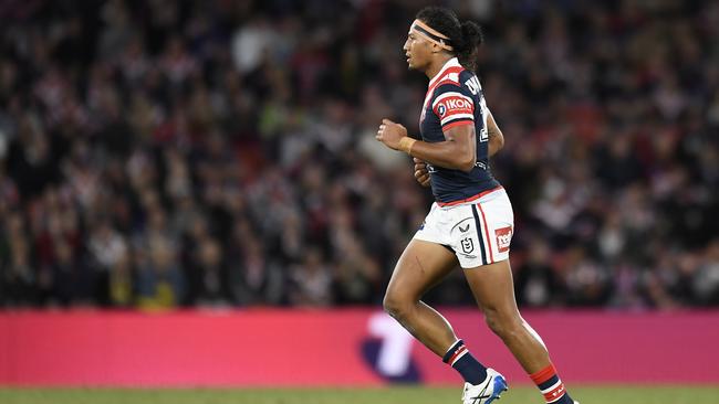 Sitili Tupouniua of the Roosters walks off the field after being sent to the sin bin during the match against North Queensland Cowboys. Picture: Albert Perez/Getty Images