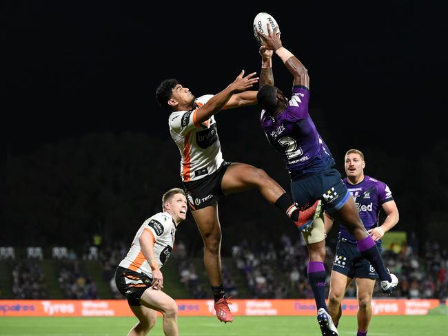 Suliasi Vunivalu of the Storm soars skywards to grab the ball before scoring a try. Picture: Matt Roberts/Getty Images