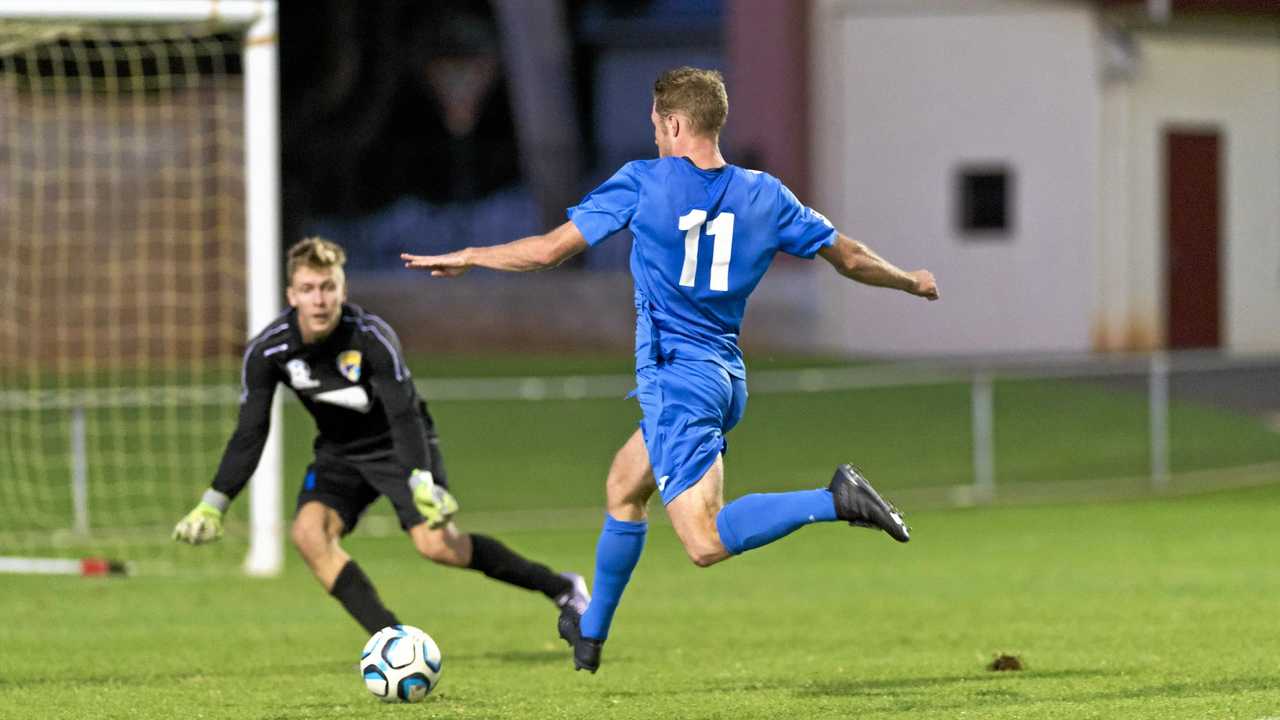 IN FORM: South West Queensland Thunder striker Chris Hatfield scores a goal against Gold Coast United. Hatfield is confident his side can record a third straight NPL win tonight when they host Brisbane City FC. Picture: Kevin Farmer