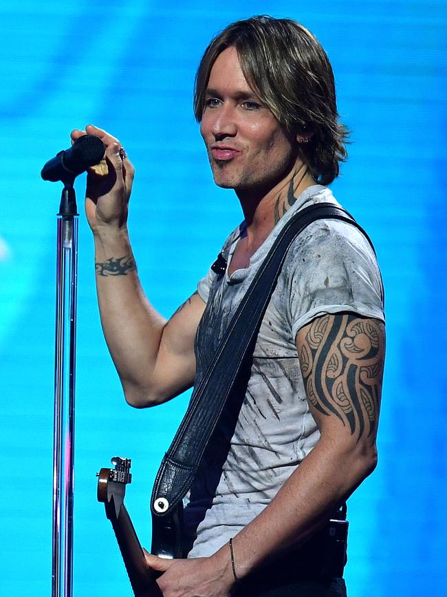 Keith Urban represents Queensland as cane toad Doug. Picture: AAP Image/Joel Carrett