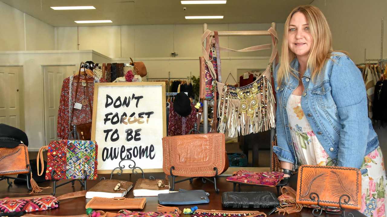 Own-brand leather handbags help differentiate T-Leaf Clothing from other shops. Picture: Julia Bartrim