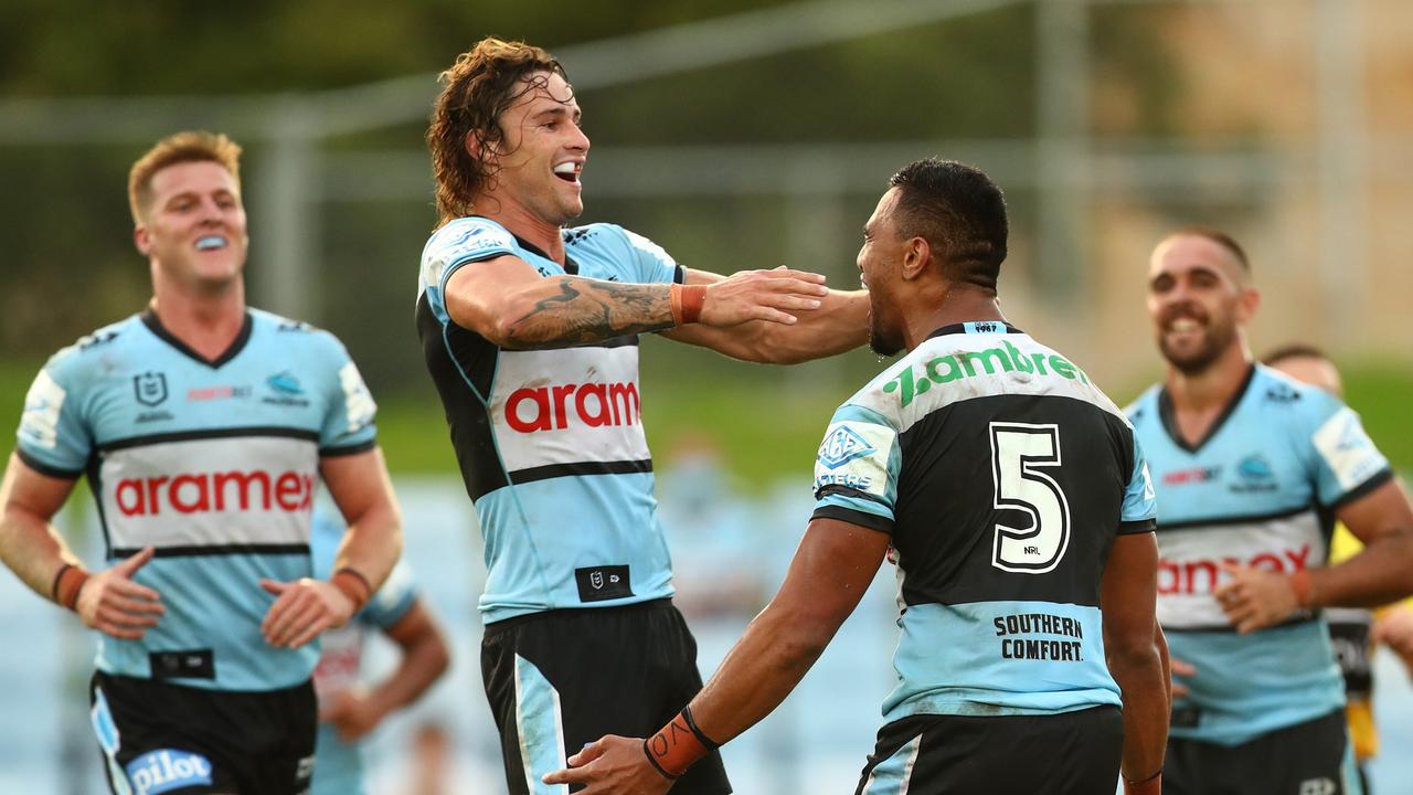 SYDNEY, AUSTRALIA - FEBRUARY 28: Ronaldo Mulitalo of the Sharks celebrates with teammate Nicho Hynes of the Sharks after scoring a try during the NRL Trial Match between the Cronulla Sharks and the Canterbury Bulldogs at PointsBet Stadium on February 28, 2022 in Sydney, Australia. (Photo by Mark Metcalfe/Getty Images)
