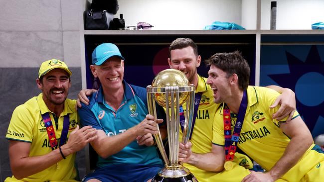 Mitchell Starc, Josh Hazlewood, Mitch Marsh and Andrew McDonald, pose with the trophy. (Photo by Robert Cianflone/Getty Images)