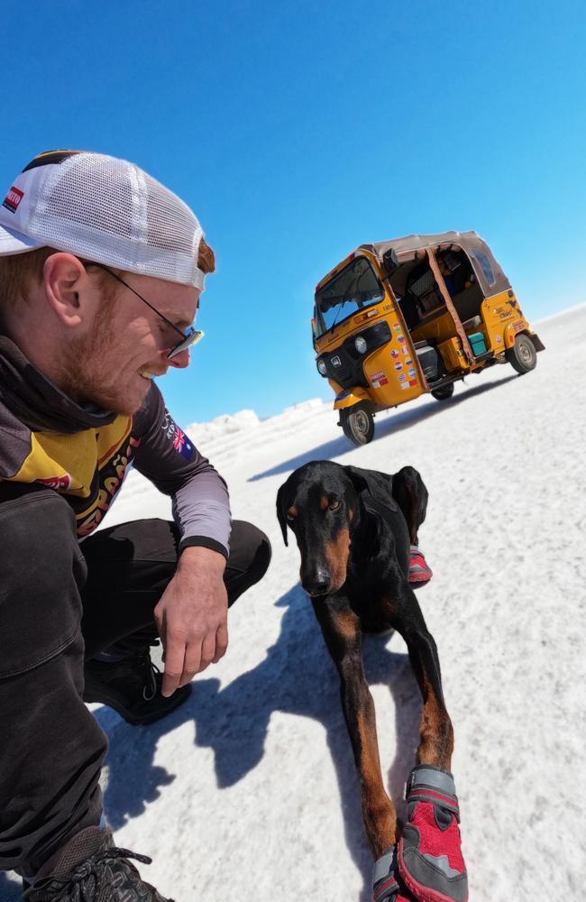 Ryan Magee, his rescued Doberman Patt, and his Tuk Tuk. Photo: Ryan Magee