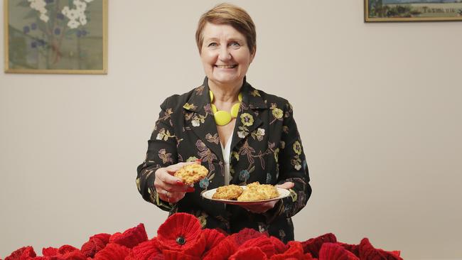 Versatile plant: Tasmanian CWA president Lindy Cleeland shows off hemp cookies and knitted poppies. Picture: Mathew Farrell