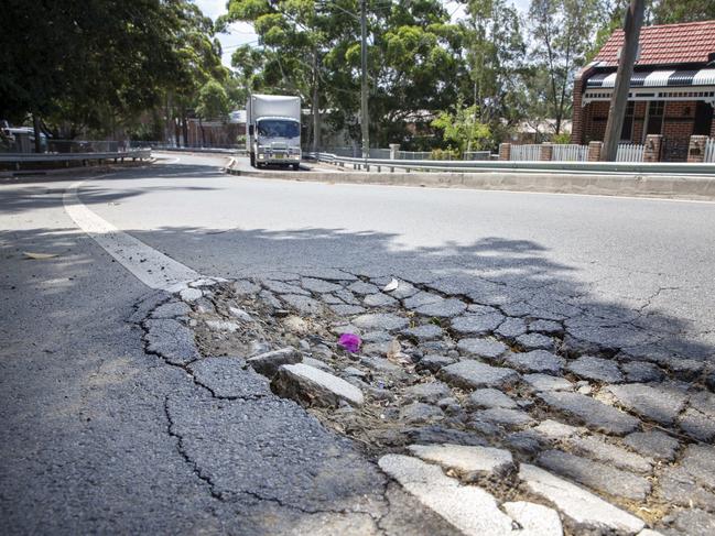 A damaged road surface at Booth Street, Annandale, on Monday. Picture: Justin Lloyd