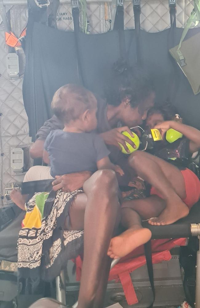 Residents from the Kalkarindji area on-board a Royal Australian Air Force C-27J Spartan as they are evacuated during major flooding in the Northern Territory.