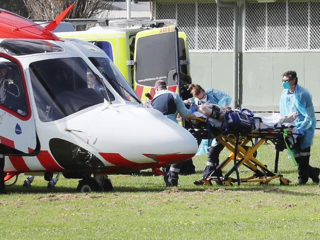 Police shooting at Lilydale. The victim is loaded into an air ambulance. Tuesday, September 15, 2020. Picture: David Crosling