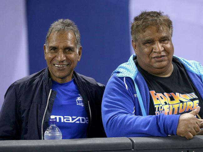 Kangaroos legends Jim (left) and Phil Krakouer ahead of the Round 10 AFL match between the Western Bulldogs and the North Melbourne Kangaroos at Marvel Stadium in Melbourne, Saturday, May 25, 2019. (AAP Image/Hamish Blair) NO ARCHIVING, EDITORIAL USE ONLY