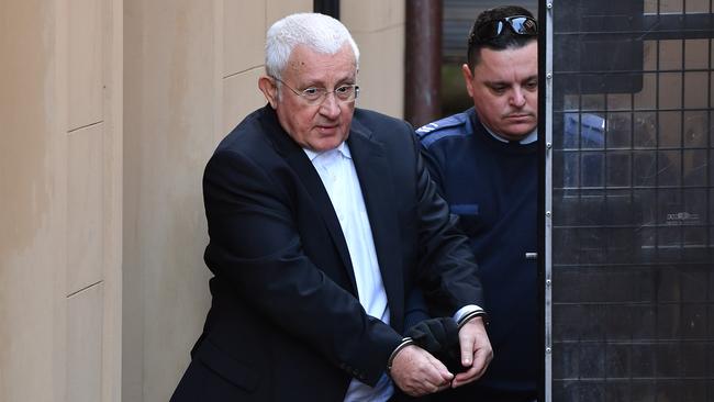 Ron Medich is escorted to a NSW Corrective services van at the NSW Supreme court in Sydney, Thursday, June 21, 2018. (AAP Image/Joel Carrett) NO ARCHIVING