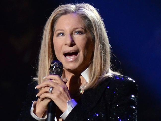 FILE - This Oct. 11, 2012 file photo shows singer Barbra Streisand performing at the Barclays Center in the Brooklyn borough of New York. The Academy of Motion Picture Arts and Sciences announced Wednesday that the 70-year-old singing veteran will hit the stage on Feb. 24. It will be her second performance at the Oscars, and her first in 36 years. (Photo by Evan Agostini/Invision/AP, file)
