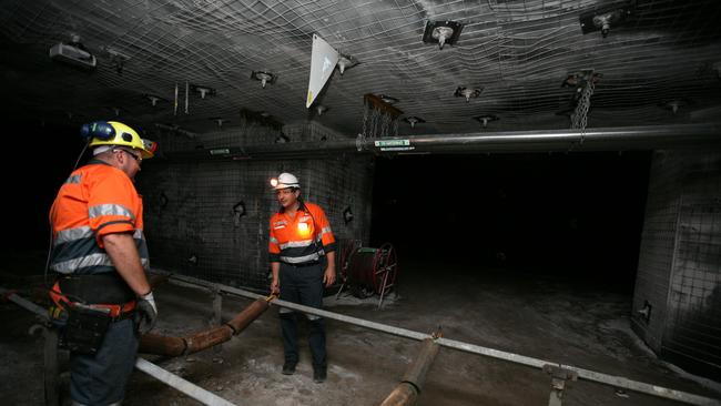 Mastermyne Trainee Graeme Willett with Managing Director Tony Caruso in the Underground Mine Simulator they created in Mackay for training purposes.