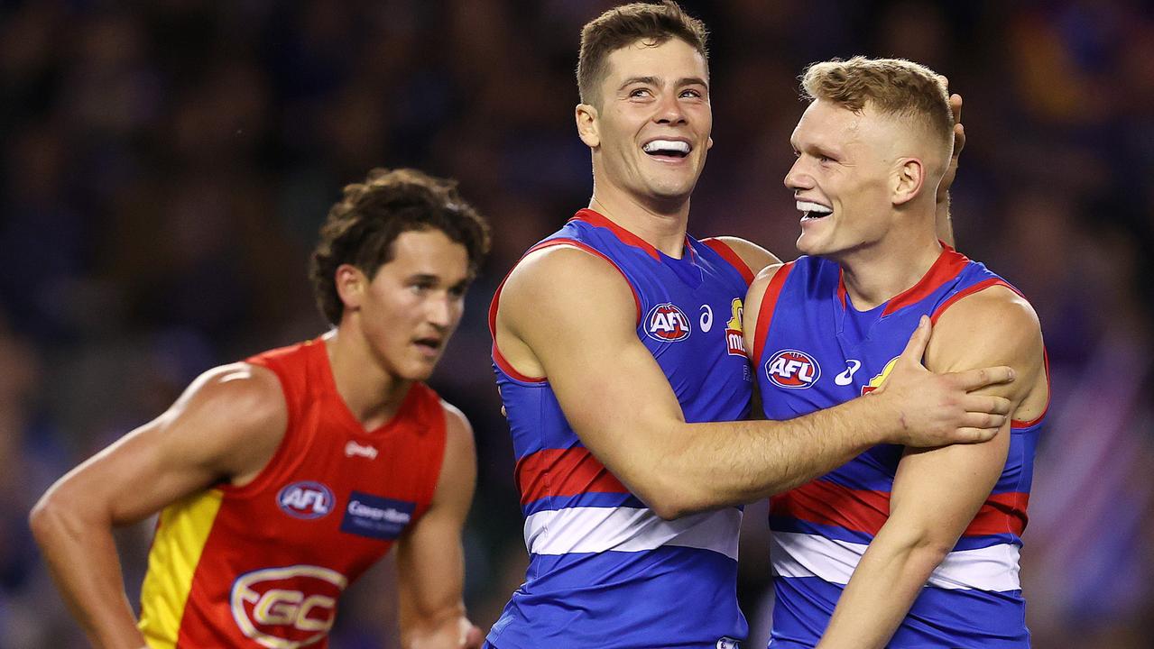 Josh Dunkley enjoys a goal with teammate Adam Treloar.